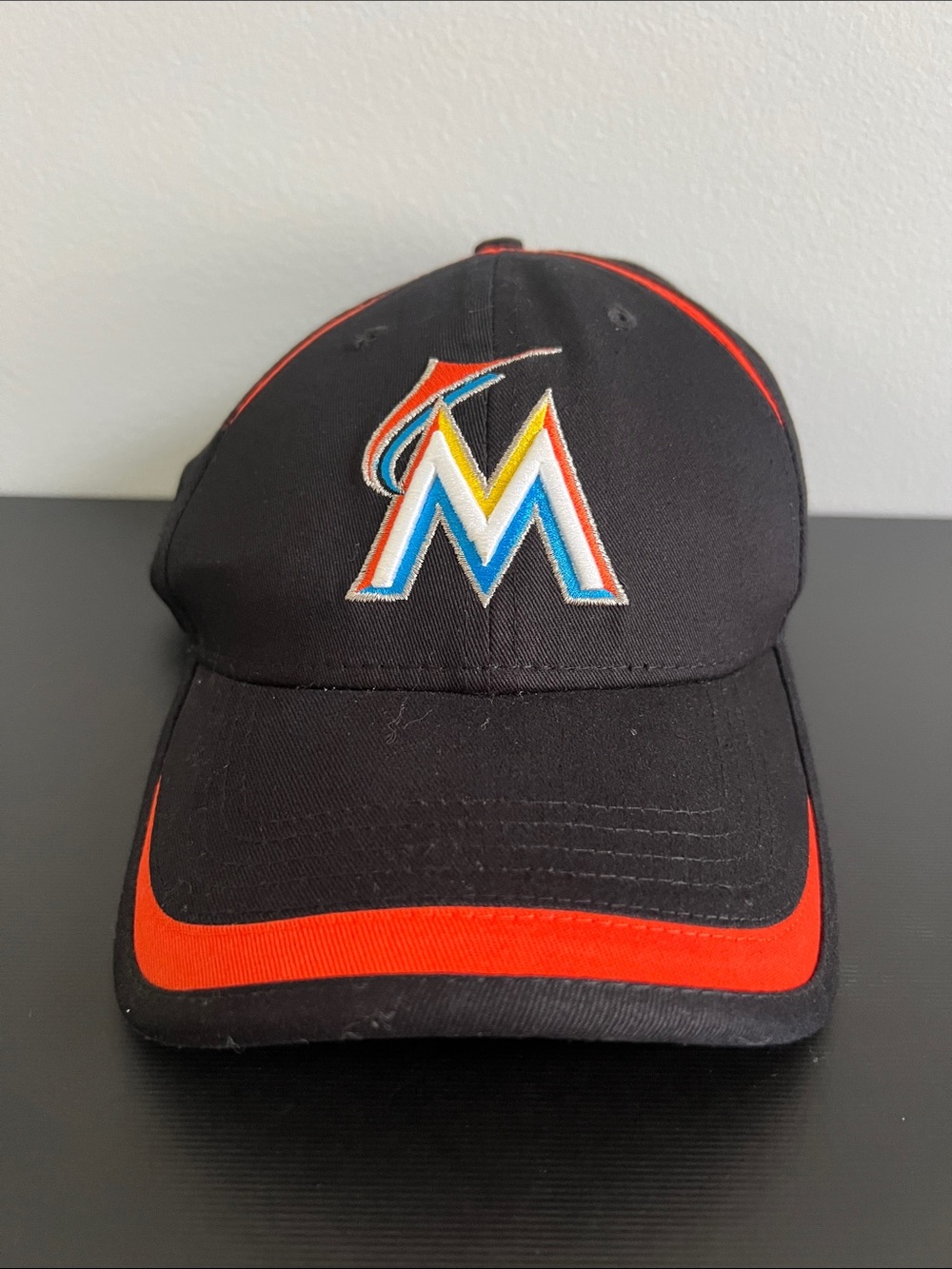 New Era Black Baseball Cap with Multicolor Miami Marlins Logo and Orange Trim
